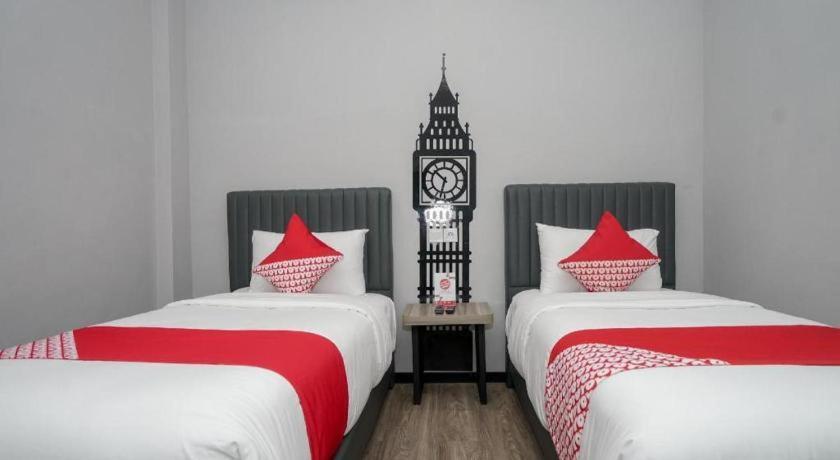 Oyo 568 Rajawali Homestay Palembang Extérieur photo