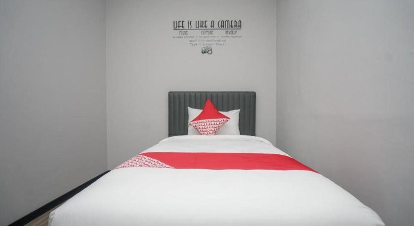 Oyo 568 Rajawali Homestay Palembang Extérieur photo